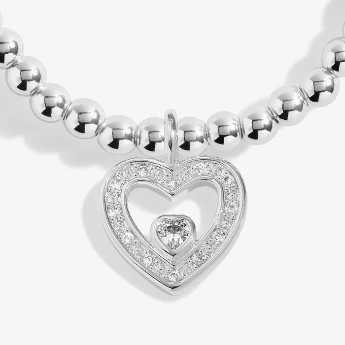 A delicate bracelet with the words "Thank you from the bottom of my heart," representing sincere appreciation.