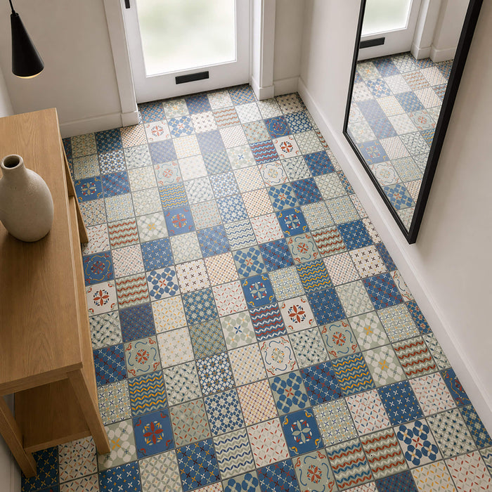 Alhambra Rigid LVT Flooring in a hallway with a wooden table and mirror in the background.