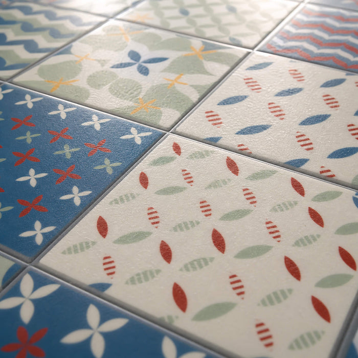 Close-up of the pattern of floral and geometric designs on Alhambra Rigid LVT Flooring.
