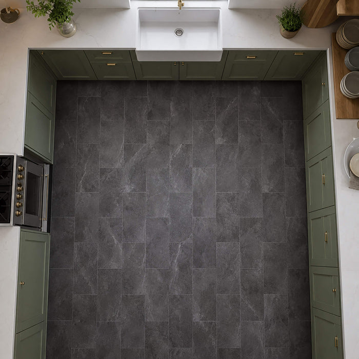 Elevated view of a Black Slate Rigid LVT floor tiles in a kitchen setting.