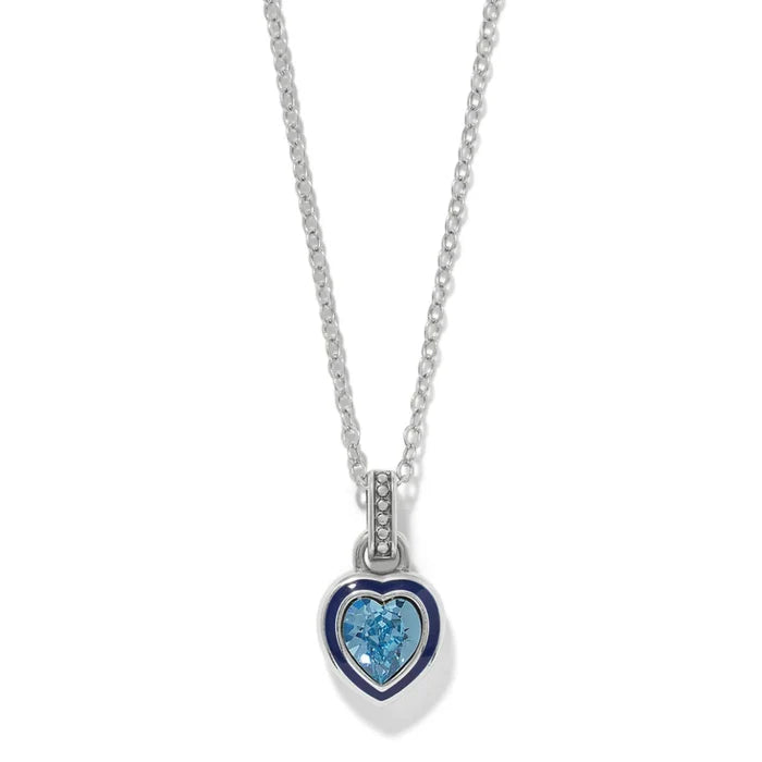 This Brighton Halo Gemma Petite Heart Necklace crafts with a sparkling gemstone center and a halo setting that catches light beautifully.