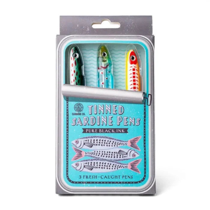 DM Merchandising Bunk House Tinned Sardine Pens featuring three sardine-shaped pens with black ink in novelty tinned-fish packaging.