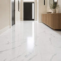 Calacatta Marble Gloss Rigid LVT floor tiles in a home hallway setting.