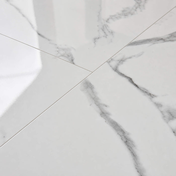 Close-up of Calacatta Marble Gloss Rigid LVT floor tiles.