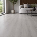 Causeway Grey Essentials laminate flooring in a modern living room setting.