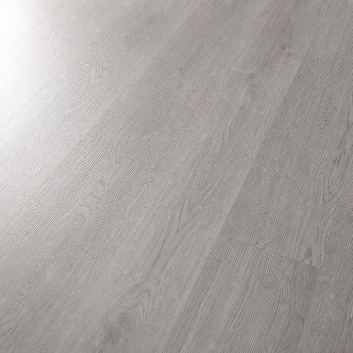 Close-up of the grain and texture of Causeway Grey Essentials laminate flooring.