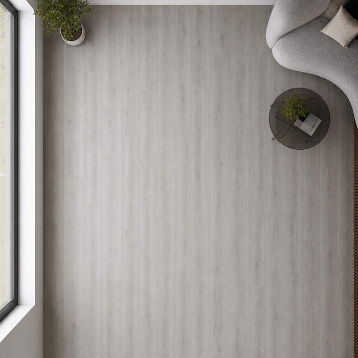 Elevated view of Causeway Grey Essentials laminate flooring in a living room setting.