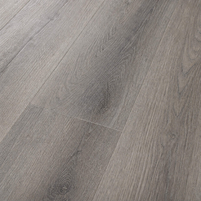 Close-up of the grain and texture of Conwy Grey Rigid LVT plank flooring.