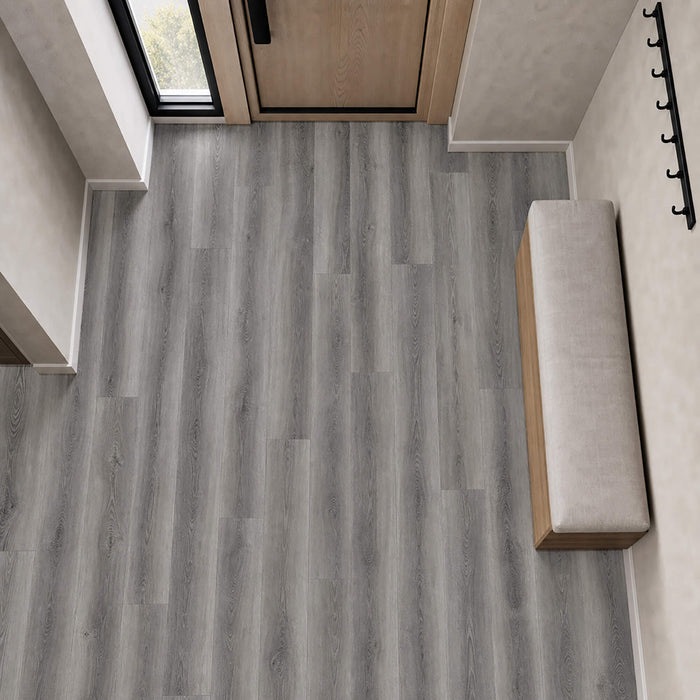 Elevated view of Conwy Grey Rigid LVT plank flooring in a hallway setting.