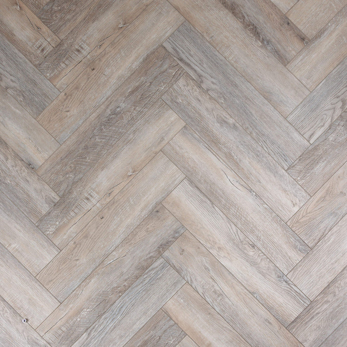 Close-up of Driftwood Oak Rigid LVT  herringbone pattern