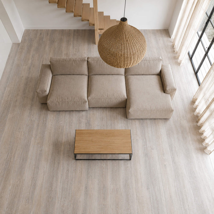 Elevation view of a living room with Driftwood Oak Rigid LVT flooring.