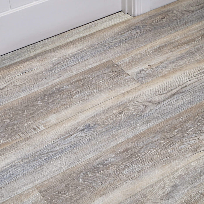 Close-up of Driftwood Oak Rigid LVT flooring in an internal setting.