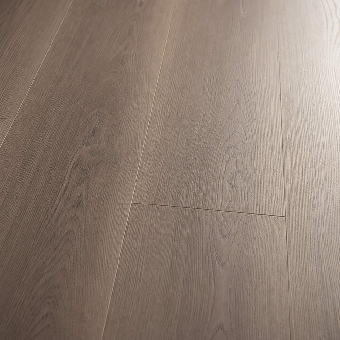 Close-up of the grain and texture of Dusky Oak Prestige Plus laminate flooring.