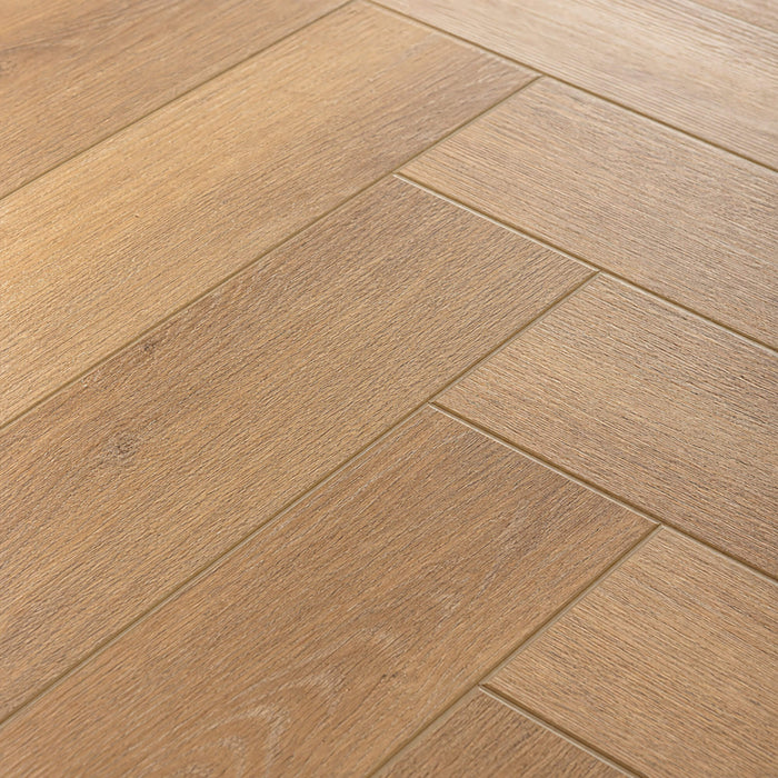 Close-up of Forest Oak Rigid LVT Herringbone Flooring
