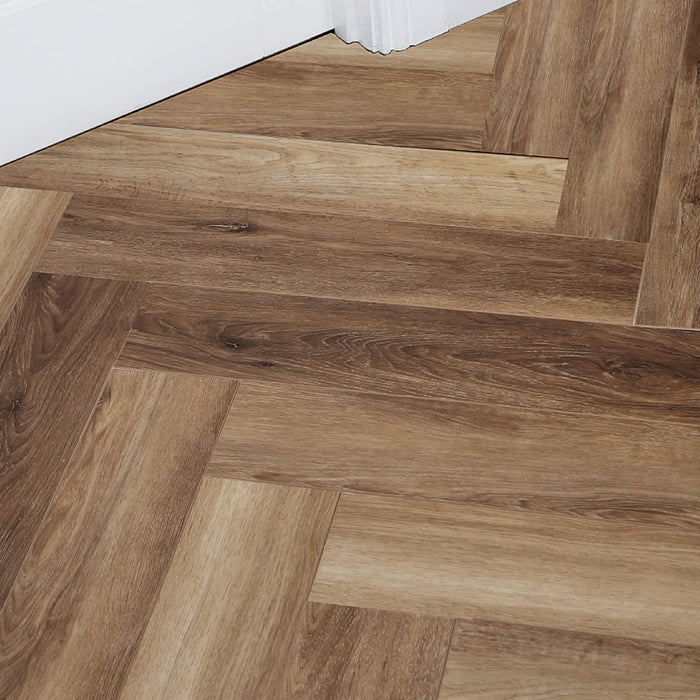 Fumed Oak Rigid LVT Herringbone Flooring in an internal home setting.