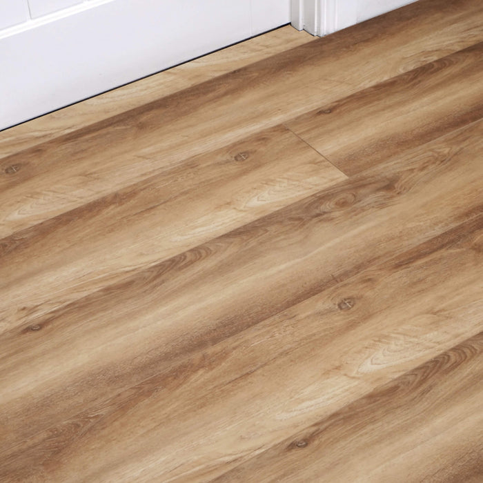Fumed Oak Rigid LVT Flooring with white architrave and door
