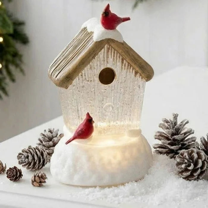 5.75-inch lighted water lantern featuring a cardinal bird house with swirling glitter