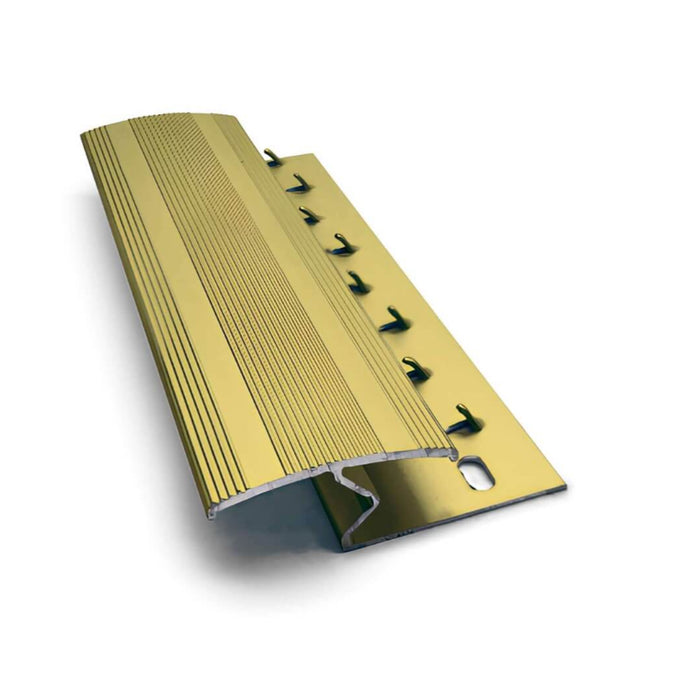 Close-up of a Gold Z Carpet Door Bar on a white background