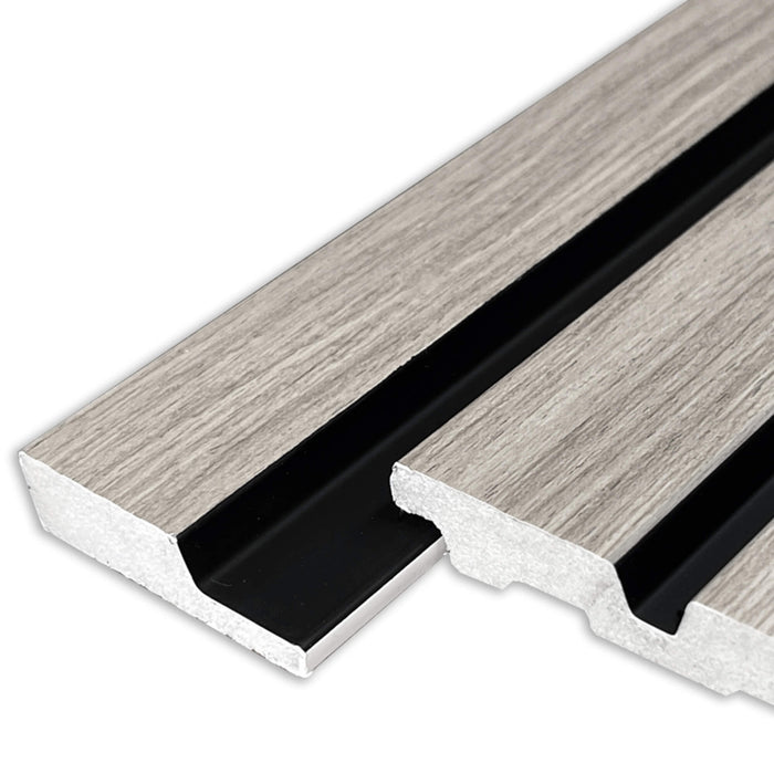 Close-up of a Grey Aqua Slatwall Right Trim being placed on a slat wall panel on a white background.