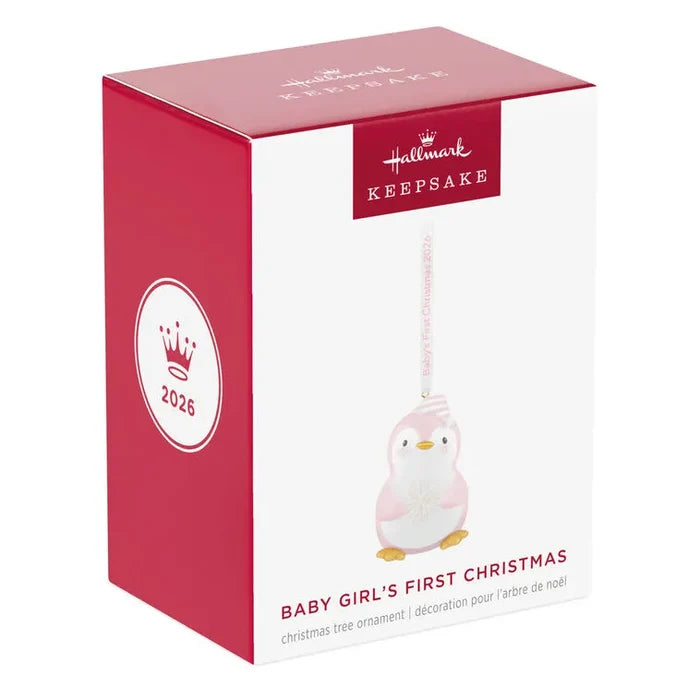Hallmark 2026 Baby Girl's First Christmas penguin ornament in red and white packaging box