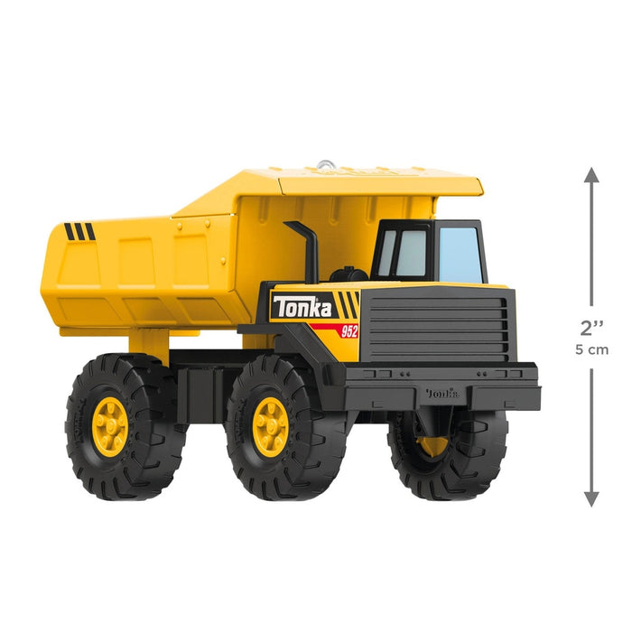 Front-three-quarter view of plastic Tonka Mighty Dump Truck ornament with blue windows