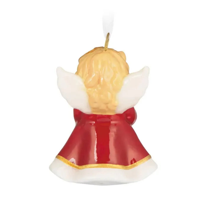 Back view of glossy red porcelain angel ornament with gold hem trim