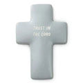 Gray cross-shaped object with 'Trust in the Lord' text on a white background