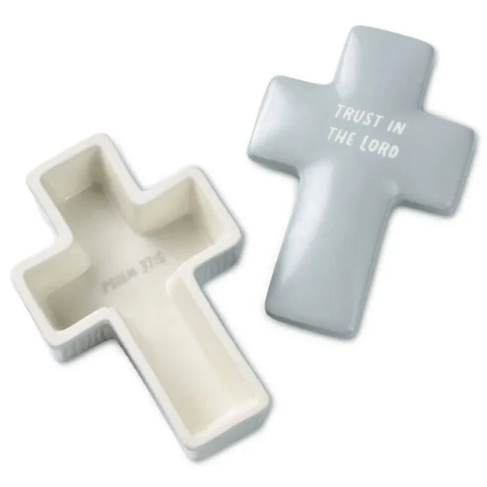 Two cross-shaped containers, one white and one gray, with 'Trust in the Lord' text on a white background.