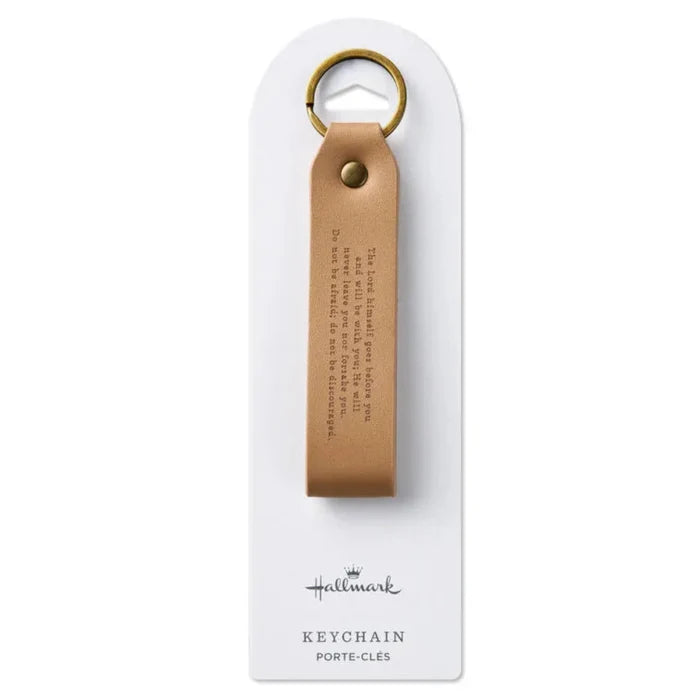 Brown leather keychain on a white card with 'Hallmark' branding