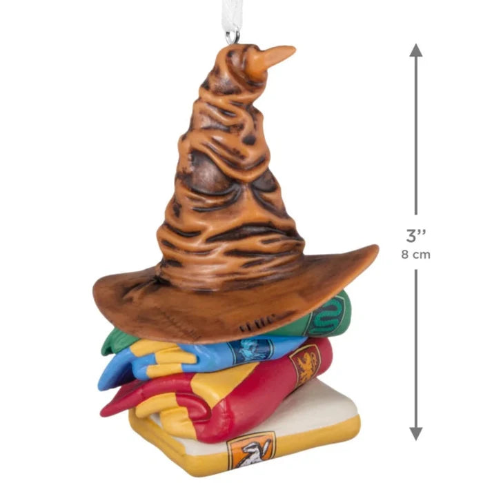 Hallmark Harry Potter Sorting Hat and Hogwarts house scarves ornament featuring the iconic Sorting Hat with Gryffindor, Hufflepuff, Ravenclaw, and Slytherin colors, collectible Christmas tree decoration.