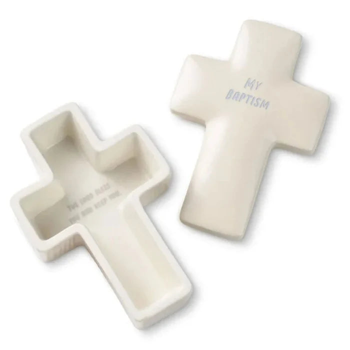Two ceramic cross-shaped containers with engraved text on a white background