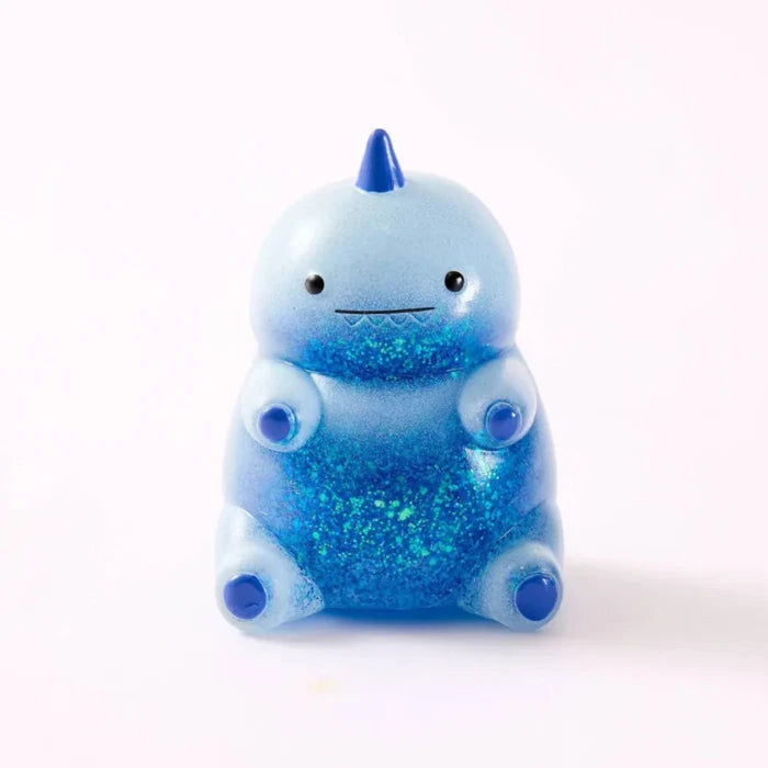 Unicorn and dinosaur sensory squeeze toy 1pk with cute character designs for kids' tactile and fidget play.