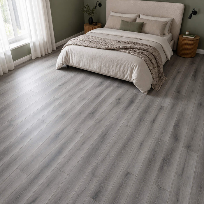 Harbour Oak Country laminate flooring in a modern bedroom setting.