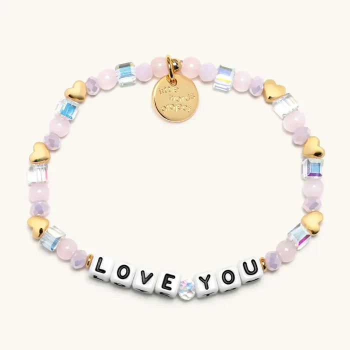 Multicolored beaded bracelet with 'LOVE YOU' charm on a white background