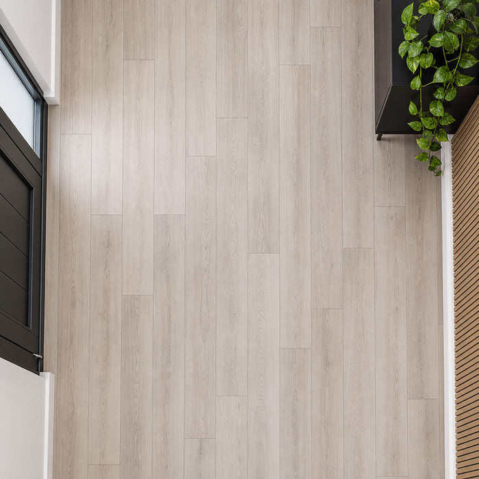 Elevated view of Marino Grey Rigid LVT flooring in a hallway setting.