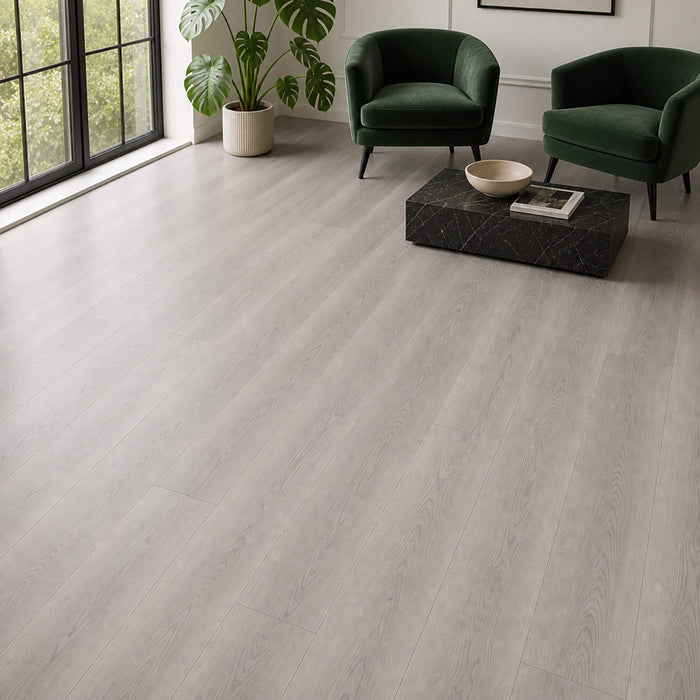 Misty Grey Prestige Plus laminate flooring in a modern living room setting.