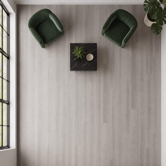Elevated view of Misty Grey Prestige Plus laminate flooring in a living room setting.