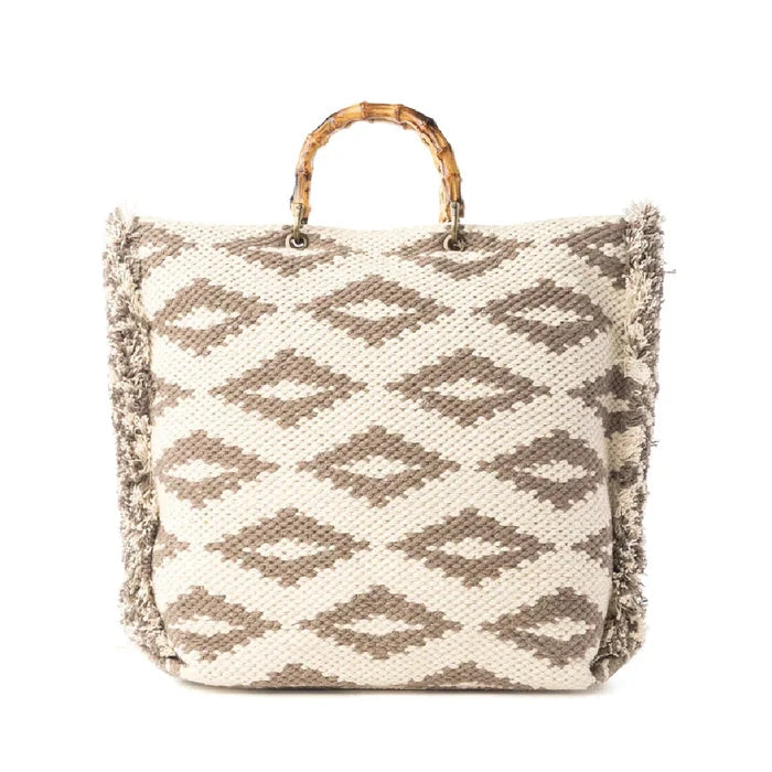 Geometric-patterned woven tote bag with elegant gold accents, combining functionality and fashion.