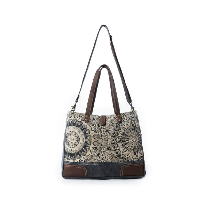 A large tote bag crafted from a blend of cotton and linen fabric, showcasing a stylish and durable design.
