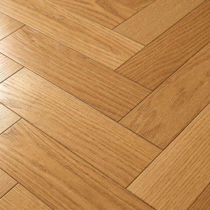 Close-up of a Natural Oak Herringbone Brushed and UV Oiled Engineered Wood Flooring.