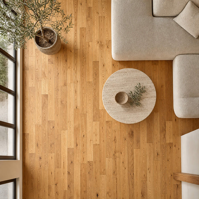 Elevated view of the 120mm Natural Oak Timberclick Lacquered Engineered Wood Flooring with visible grain and texture.