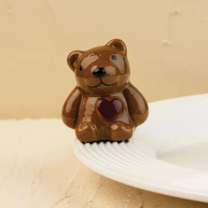 Designed to fit your favorite Nora Fleming serving base, the Bear With Me Mini makes it easy to create meaningful tablescapes that celebrate life's most treasured moments.