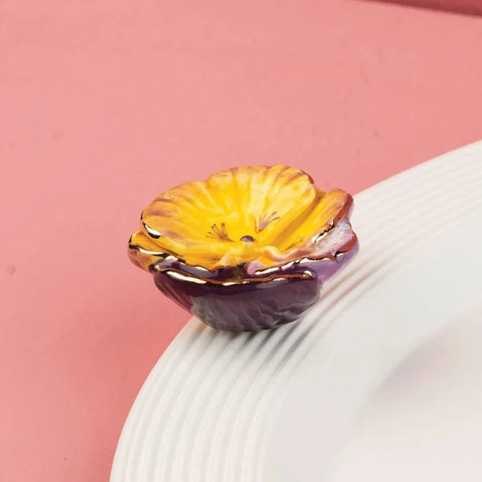 A thoughtful gift for Nora Fleming collectors and flower lovers.