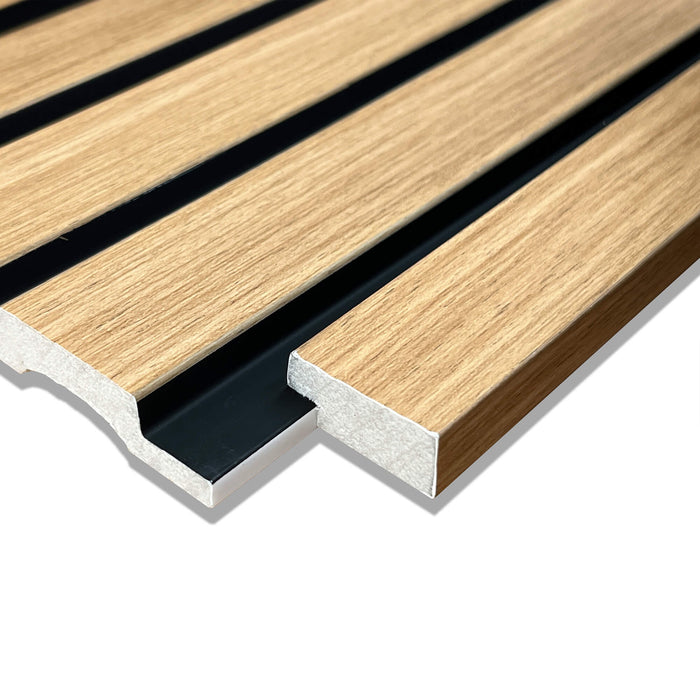 Close-up of Oak Aqua Slatwall Left Trim connecting to a a slat wall panel on a white background