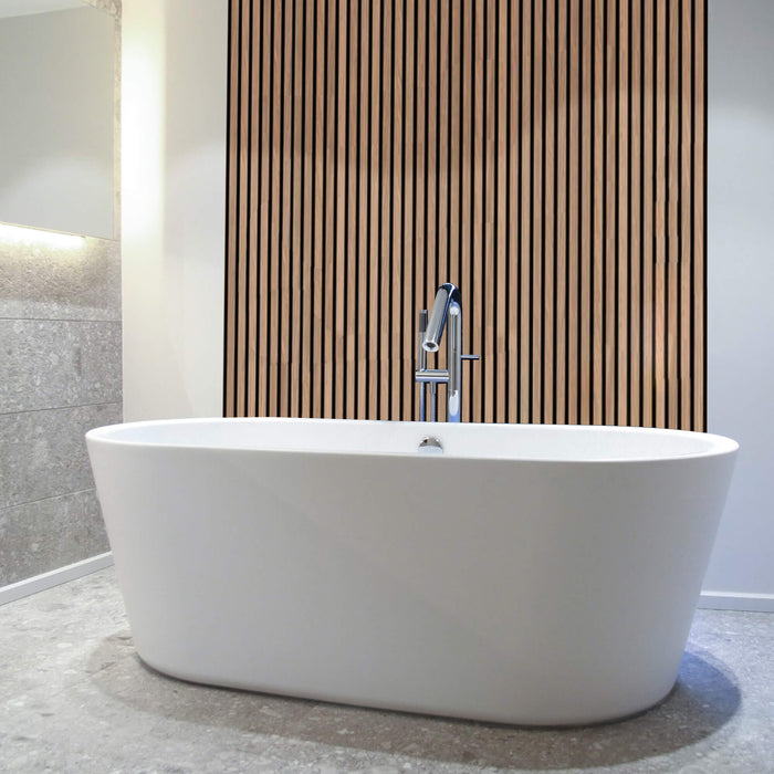 White freestanding bathtub in a modern bathroom with Oak Aqua Slatwall Panelling.