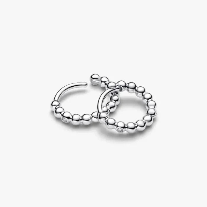 PANDORA Beaded Huggie Earrings in 14k gold plating with delicate bead detailing and a sparkling center stone