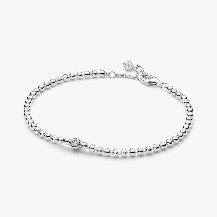 PANDORA Beads & Sparkling Stone Bracelet in sterling silver with polished beads and a bezel-set sparkling stone