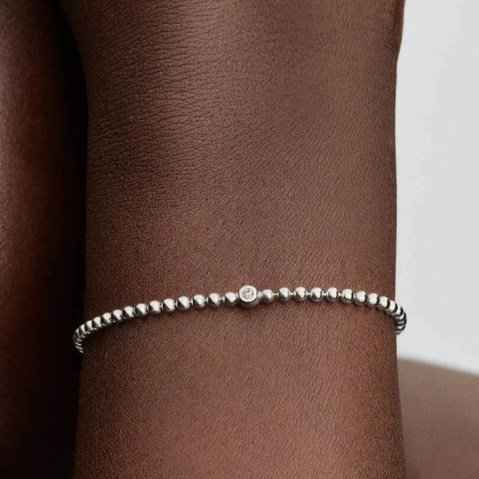 PANDORA Beads & Sparkling Stone Bracelet in sterling silver with polished beads and a bezel-set sparkling stone