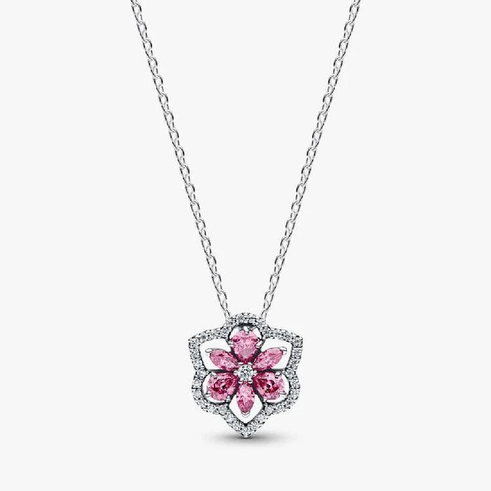 A pink flower pendant adorned with diamonds, elegantly hanging from a delicate chain.