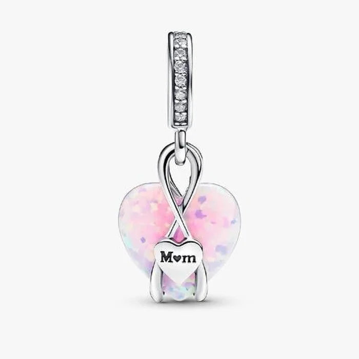 This Pandora Mum Opalescent Heart Dangle Charm offers a beautiful way to celebrate the special bond between a mother and child.